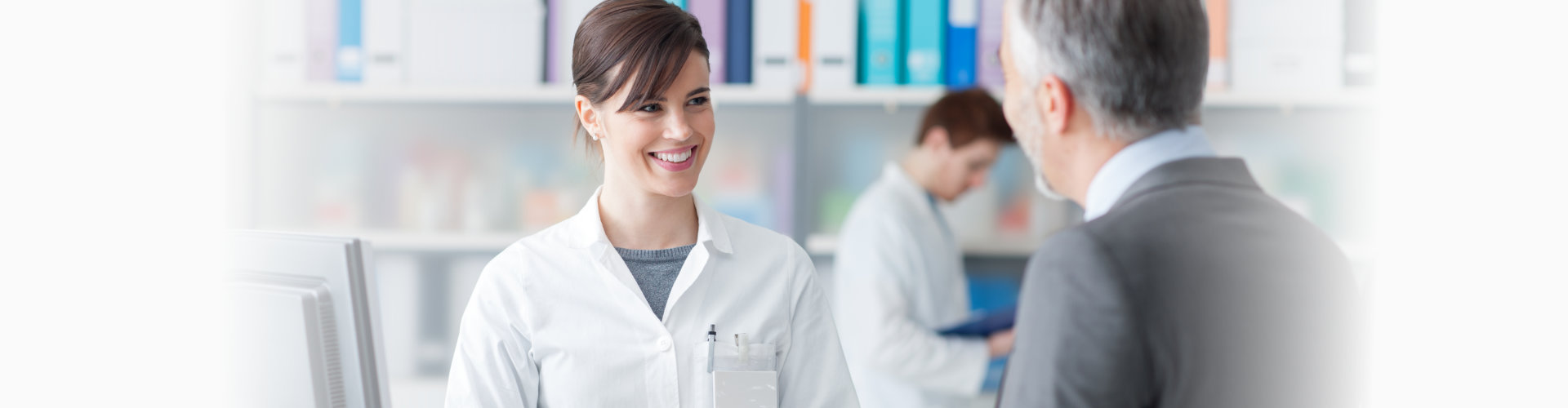 nurse giving a prescription to customer