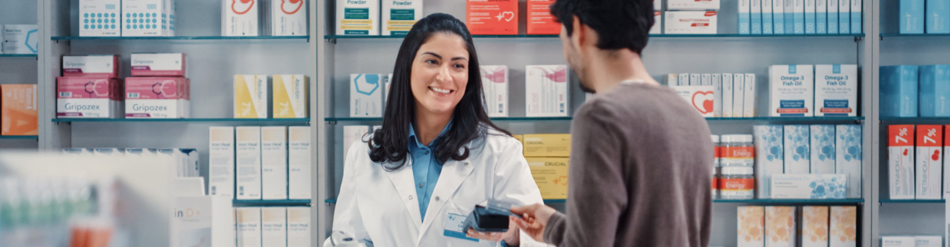 image of adult guy buying drugs in pharmacy